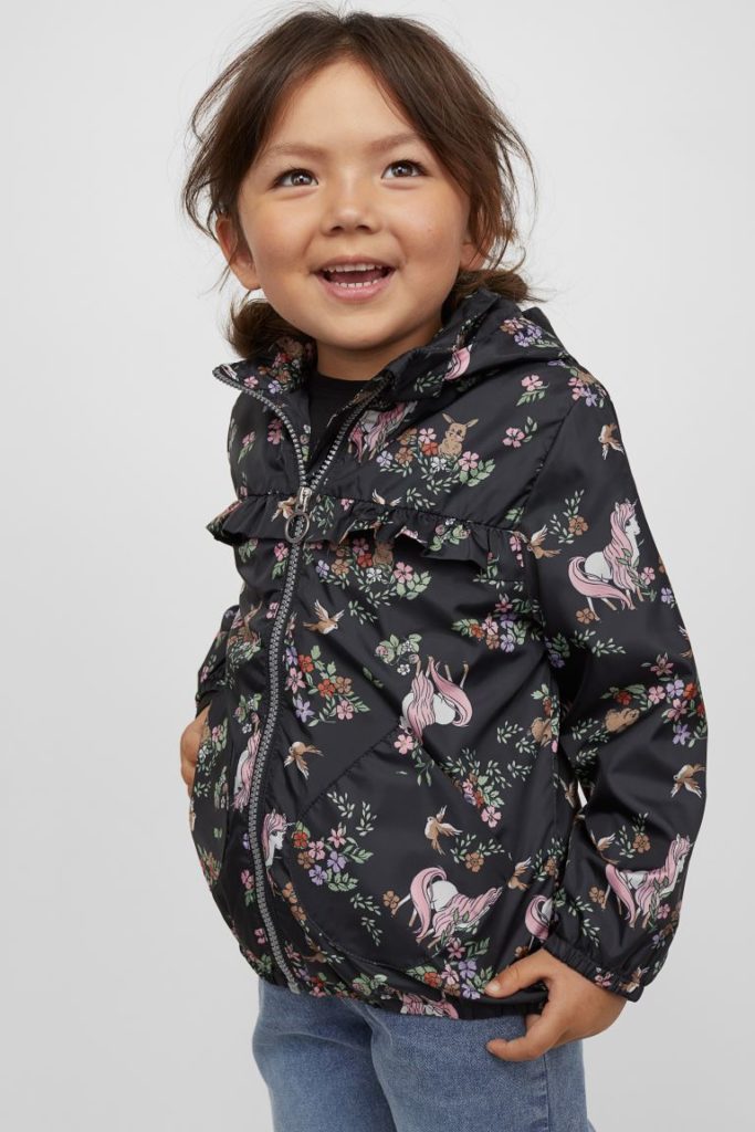 Affordable rain jackets for little kids: This stylish Unicorn jacket is really a windbreaker, but perfect if you live in a climate without a lot of heavy rain